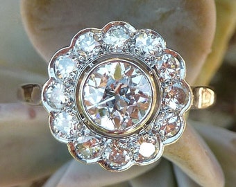 Reserved for J - 4/6 - Art Deco daisy ring in 0.70ct old mine cut diamond and platinum, circa 1910-30, France