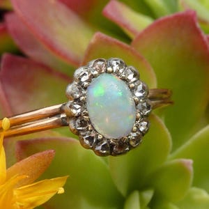 Marguerite Opal Ring and Rose Cut Diamonds in 18K Rose Gold and Silver, 19th Century