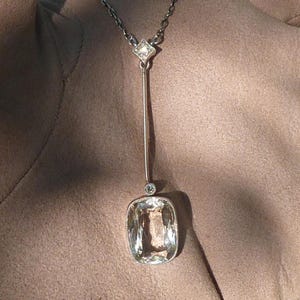 Art Deco necklace, aquamarine pendant with old mine cut diamonds, in platinum and 18K yellow gold, circa 1910-30