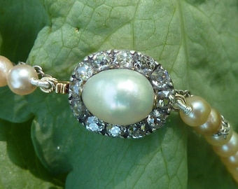 Art Deco necklace with cultured pearls and clasp in diamonds and 18k white gold, circa 1920-30, France