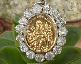 Our Lady of the Virtues of Ligny pendant, églomisé glass and solid silver, 1900-1910, France