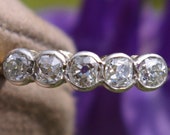 Half alliance old mine cut diamonds in Platinum and yellow 18k gold ring, early 20th