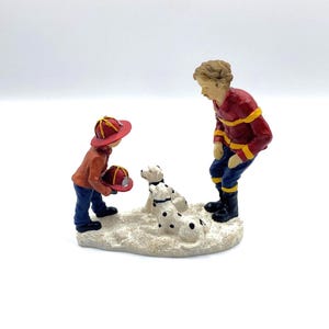 Vintage Firefighter with Dalmatians Figurine