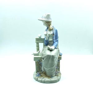 Vintage Porcelain Woman with Pidgeons Figurine
