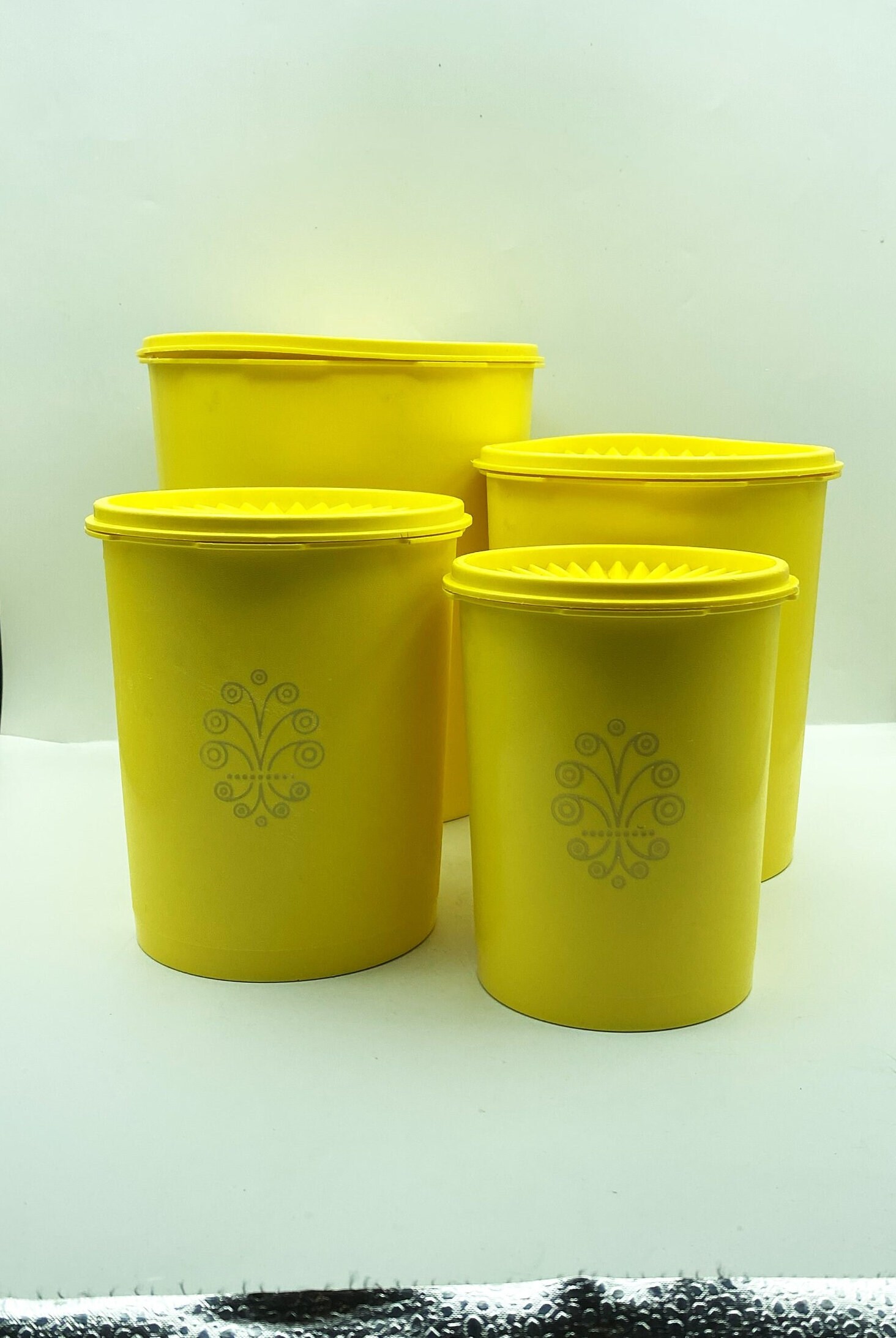 Set of 4 Tupperware Daffodil Yellow Servalier Canisters with Sunburst Lids
