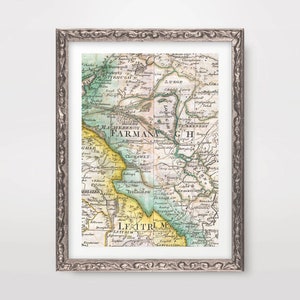 May include: An antique map of Ireland with a detailed illustration of the counties of Leitrim, Fermanagh, and Cavan. The map is printed in shades of green, yellow, and brown, with text labels for each county and town.