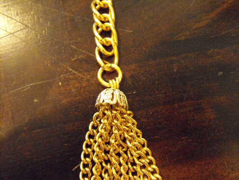 Gold Chain with Decorative Tassel Piece at the Bottom Adjustable in Length Fish Hook Clasp