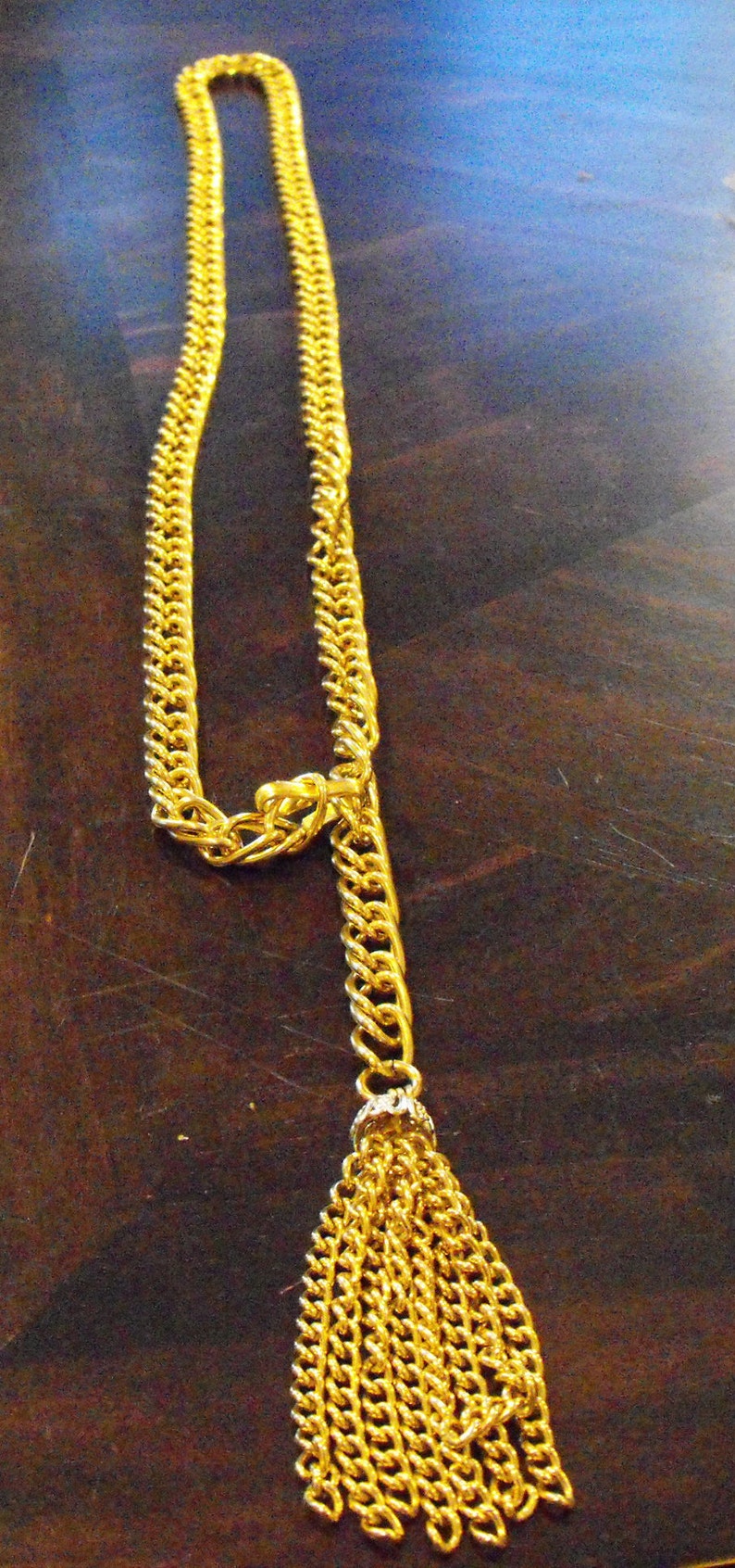 Gold Chain with Decorative Tassel Piece at the Bottom Adjustable in Length Fish Hook Clasp