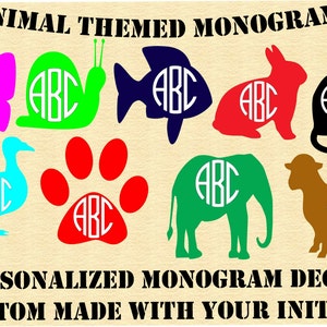 May include: A set of ten animal-themed monogram decals. The decals feature a variety of animals, including a butterfly, snail, fish, rabbit, cat, goose, paw print, elephant, and sheep. Each decal has a white circle with the letters "ABC" inside. The decals are perfect for personalizing items such as laptops, water bottles, and car windows.