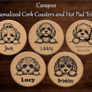 May include: Set of five cork coasters featuring personalised names and black and white illustrations of Cavapoo dogs. The names on the coasters are Jack, Libby, Lucy, Brinkley, and Schoonveld Kennels.