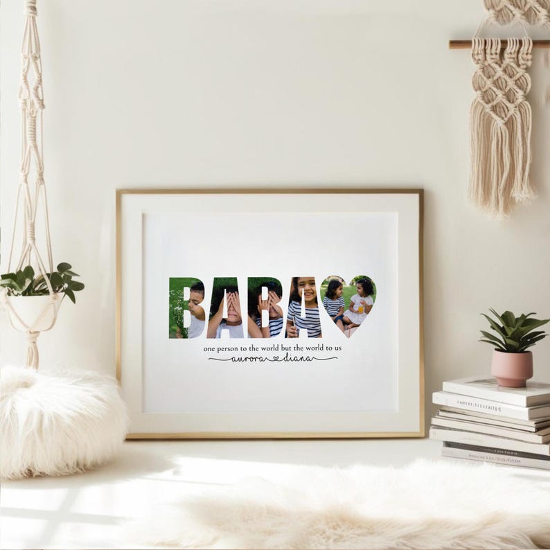 May include: A framed print with the word "BABAS" in large letters, each letter filled with a different photo. The last letter is a heart shape. Below the word is the text "one person to the world but the world to us" and "aurora & diana".