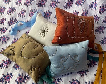 Apprentice-made silk pinwork cushion