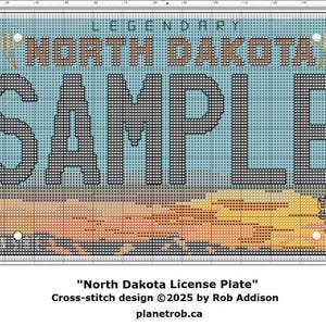May include: Cross-stitch design of a North Dakota license plate. The plate features the word "SAMPLE" in large black letters, with "NORTH DAKOTA" above. A bison is depicted on the right side, with a sunset scene at the bottom.