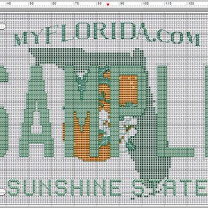 Peut inclure: Une plaque d'immatriculation de Floride verte et orange avec le texte "SAMPLE" et "MYFLORIDA.COM" et les mots "SUNSHINE STATE" en bas.