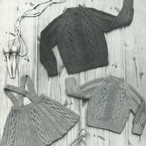 May include: A knitting pattern for a jumper and skirt for children. The pattern is for sizes 2, 4, and 6 years. The pattern is from the Sunbeam Soft Spun double knittings collection. The pattern number is 363.