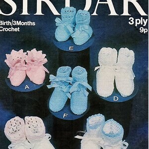 May include: A vintage advertisement for Sirdar crochet baby booties. The image displays six pairs of crocheted baby booties in various colors, including pink, blue, and white. Each pair is adorned with bows. The text on the top reads "Sirdar" and "3175".