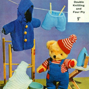 May include: A knitting pattern for a teddy bear wearing overalls, a striped hat, and mittens. The pattern is from Robin Double Knitting and Four Ply yarn. The pattern number is 1175.