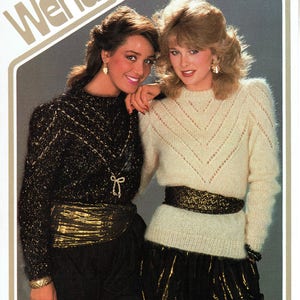 May include: Two women wearing sweaters with a v-neck design. The sweater on the left is black with gold glitter and the sweater on the right is white with a lacy pattern. Both sweaters are worn with a gold belt. The image includes the text "Wendy" and "2190 Mohair".