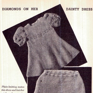 May include: A knitted baby dress and matching knickers in a light grey color. The dress has a diamond pattern on the neckline and sleeves. The text "DIAMONDS ON HER" and "DAINTY DRESS" is visible in the image.