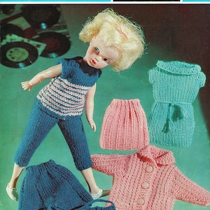 May include: A vintage image showcasing a doll wearing a knitted outfit. The outfit includes a blue and pink striped top, blue pants, and a matching purse. Additional knitted pieces in pink and teal are also displayed. The text reads "Majestic 3 ply or Gaiety Nylon 3 ply Dolls Teenage Outfit - to fit 12" Doll".