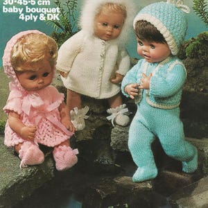 May include: Three knitted doll outfits for 30-45.5 cm dolls. The outfits are a pink dress with a matching hat, a white cardigan with a matching hat, and a blue sweater with a matching hat. The outfits are all made with a 4-ply yarn and are suitable for a baby bouquet.