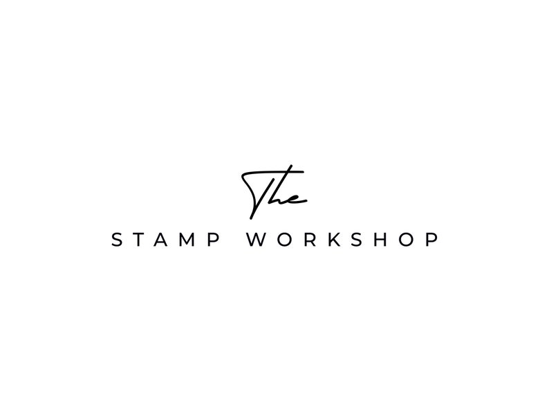 May include: The Stamp Workshop logo, a handwritten signature style font with the word "The" in black.