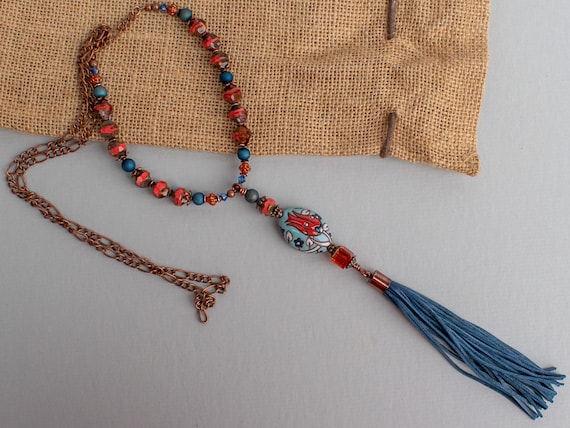 Artisan Golem Focal Navy Leather Tassel Necklace, Red Orange Blue, Ceramic Floral, Boho Style Accessory