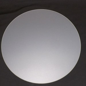 May include: A frosted glass circle, approximately 30 cm in diameter.