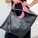 see more listings in the Black leather handbags section