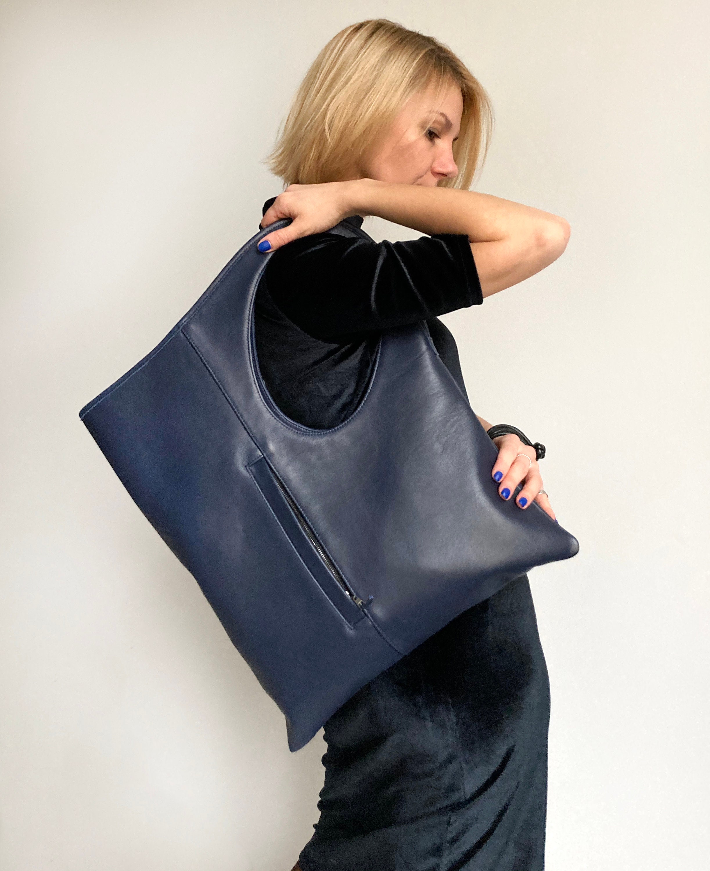 Navy leather designer handbags clearance