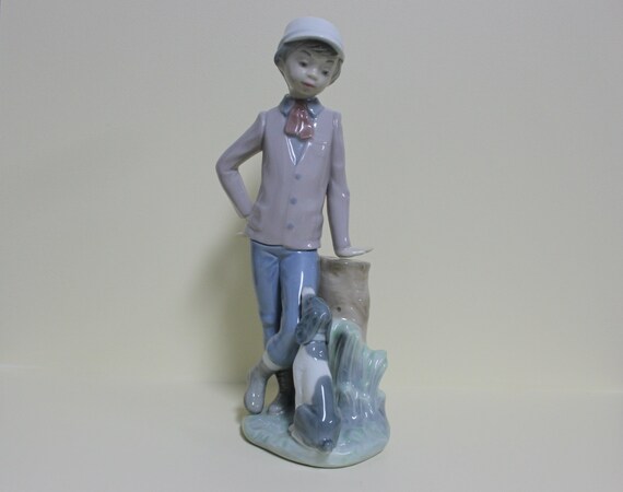 lladro figurines boy with dog