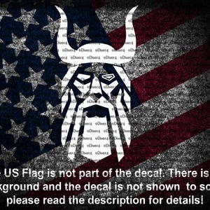 May include: A white Viking head graphic with horns and beard, set against a distressed American flag design. The text at the bottom reads, "The US Flag is not part of the decal. There is no background and the decal is not shown to scale, please read the description for details!"