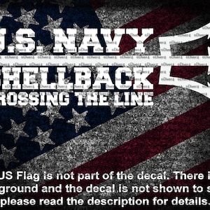 May include: A white decal with the text "U.S. NAVY SHELLBACK CROSSING THE LINE" on a red, white, and blue American flag background.