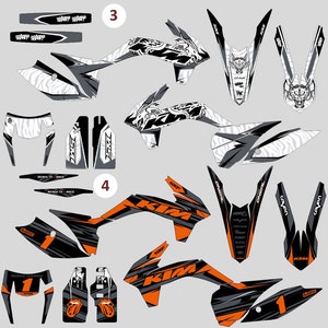 May include: A set of motorcycle graphic decals featuring two distinct color schemes. The top set is black, white, and gray with dragon motifs. The bottom set is black, orange, and gray with the number 1, KTM branding, and tongue logos.