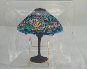 Tiffany water-lily lamp painted on a glass plate