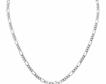 May include: A silver-toned Figaro chain necklace featuring a repeating pattern of three small circular links followed by one elongated oval link. The necklace is secured with a lobster claw clasp and includes small metal tags marked Italy and 925.