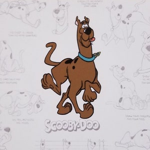 Odnowione pudełko po cygarach, udekorowane wewnątrz i na zewnątrz fotokopiami starych komiksów o Scoobym Doo, przedstawiających Scooby'ego i jego przyjaciela Kudłatego!