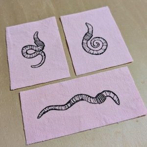 earthworm patches // block printed // pink cotton canvas // handmade