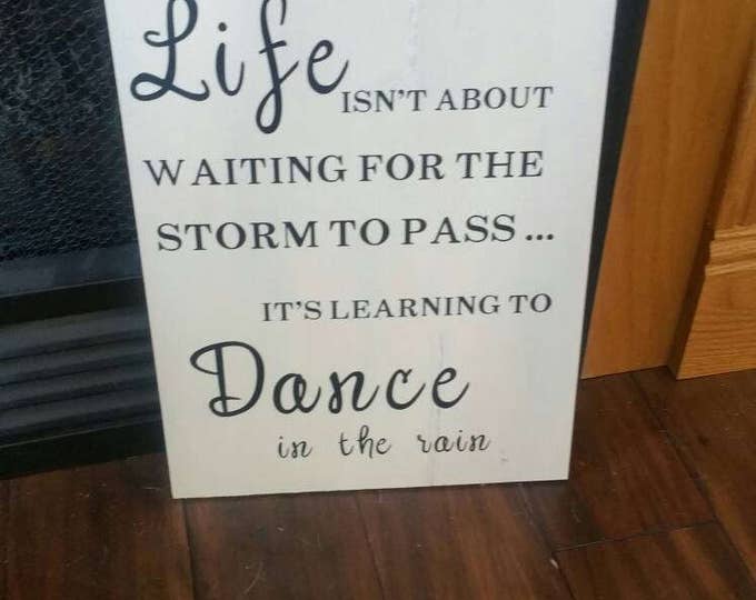 Life isn't about waiting for the storm to pass it's learning to Dance in the rain. Dancing in the rain, inspirational signs, life lessons