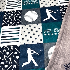May include: A patchwork baby blanket with a baseball theme. The blanket features a variety of baseball-related designs, including bats, balls, and players. The blanket is made of soft, comfortable fabric and is perfect for cuddling up with your little one. The blanket is also machine washable for easy care.
