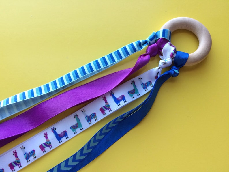 Waldorf hand kite toy natural wood rung and ribbon blue and purple llama great stocking stuffer