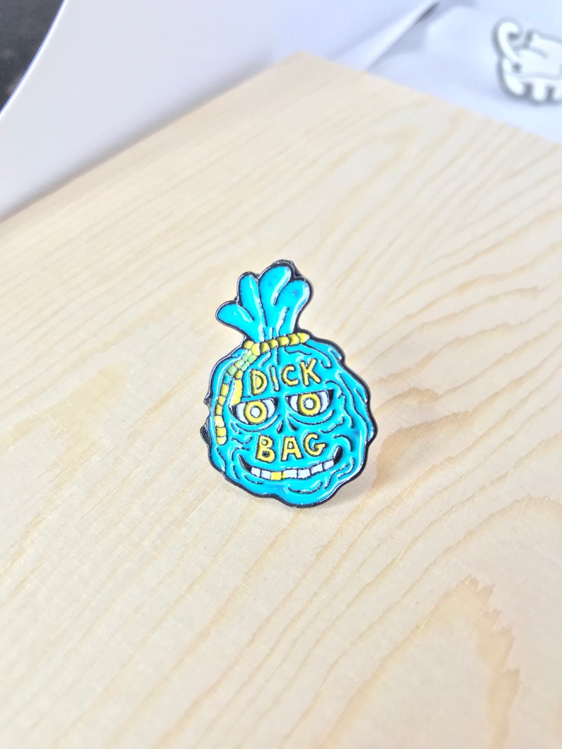 Dick bag enamel pin