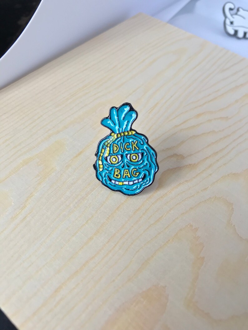 Dick bag enamel pin