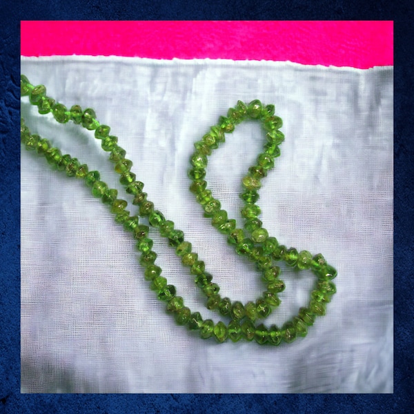 Peridot - 2x4mm saucer shape. 14" strand of Natural bright green gemstone stone beads.
