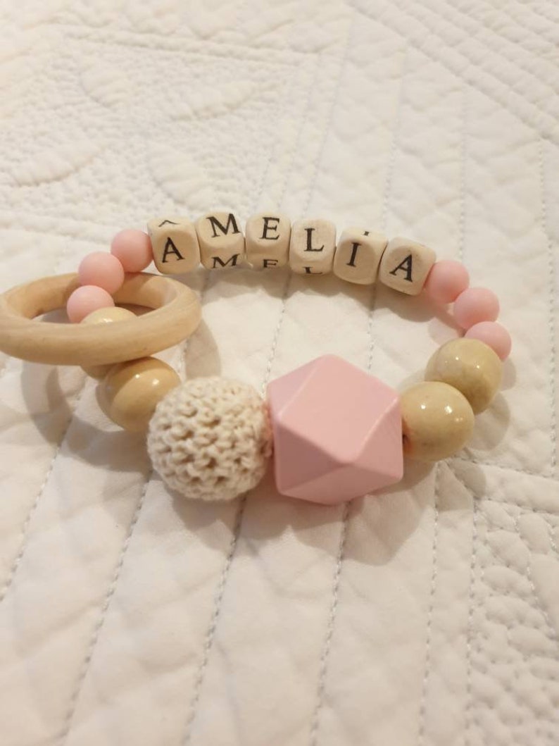 Personalised made-to-order baby wooden teether ring rattle in lovely gift box.