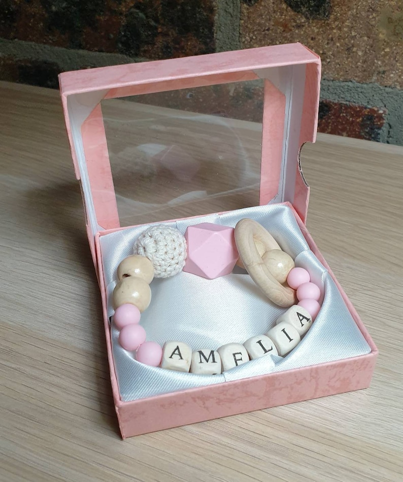 Personalised made-to-order baby wooden teether ring rattle in lovely gift box.