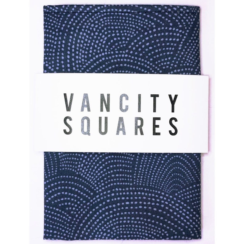 Mens blue was pocket square with white waves with custom thread.