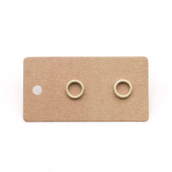 Mini circle outline. 8 mm hand-soldered stud earrings made from matt brass and stainless steel