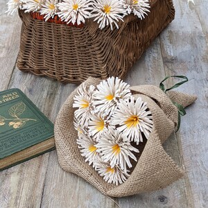 Wooden daisy bouquet wrapped in natural hessian