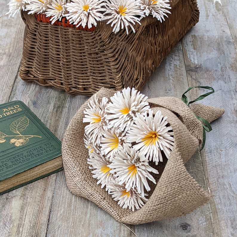 Wooden daisy bouquet wrapped in natural hessian
